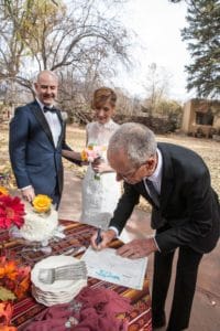 Getting the license signed is one of the tasks of wedding officiant services