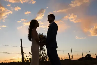 Silhouettes of a bride and groom at their wedding