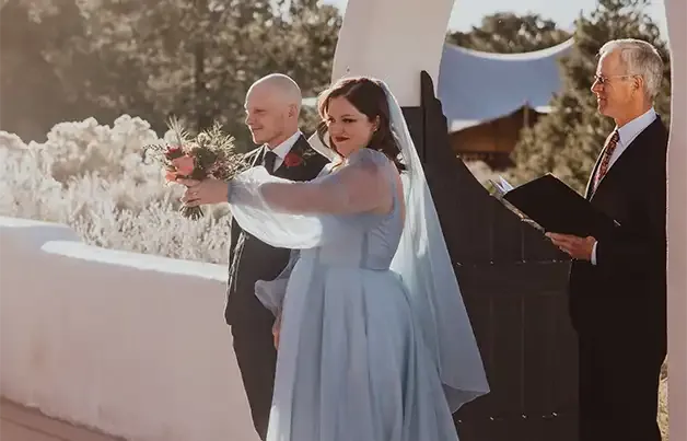 The bride and groom turn to face their guests at the conclusion of a wedding ceremony by Dan Jones