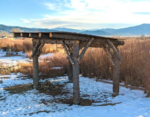A covered ramada is under construction for weddings in inclement weather.