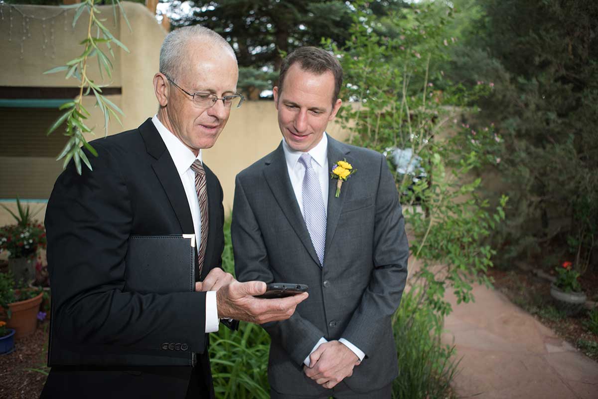 Dan distracts the groom before the processional.
