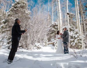Dan Jones officiates a winter wedding at the Taos Ski Valley