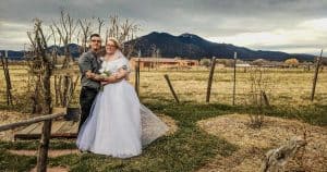 Couple posing for photos at SpiriTaos Gardens